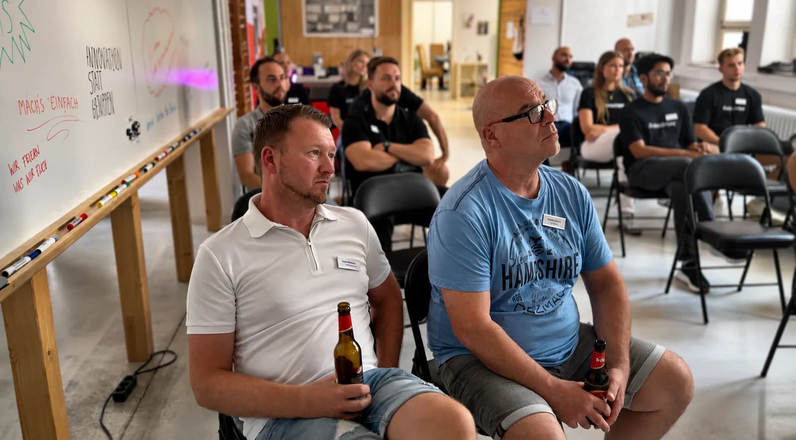 Gäste verfolgen einen Vortrag beim Hero Community Day 2026